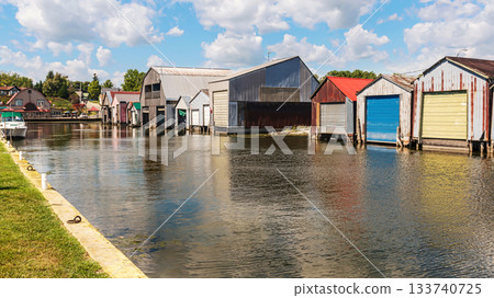 The boat houses at Port Rowan harbor on Lake Erie in Ontario, Canada. 133740725