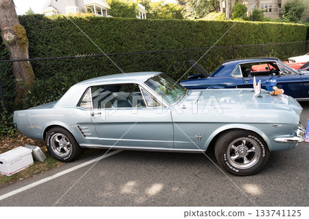 Seattle, WA, USA -July 3, 2024: Mint Red Ford Mustang 1965 1966. American classical retro car Seattle, WA, USA -July 3, 2024: Mint Red Ford Mustang 1965 1966. American classical retro car 133741125