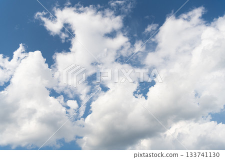 Sky with white cloud. Beauty white cloudy on blue sky with soft sun light, Nature view soft white clouds on pastel blue sky background 133741130