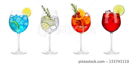 Blue Lagoon, Gin Tonic, Aperol Spritz, Cape Codder cocktail transparent PNG set bundle, isolated background. Refreshing summer cocktails in wine glass with garnish Blue Lagoon, Gin Tonic, Aperol Spritz, Cape Codder cocktail transparent PNG set bundle, isolated background. Refreshing summer cocktails in wine glass with garnish 133743119