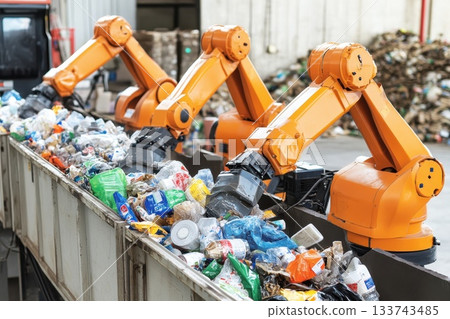 Robotic Arms in High-Tech Recycling Facility for Waste Management 133743485