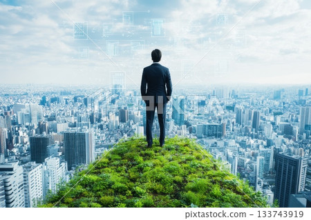 Executive Standing on High-Tech Rooftop Overlooking City Skyline 133743919