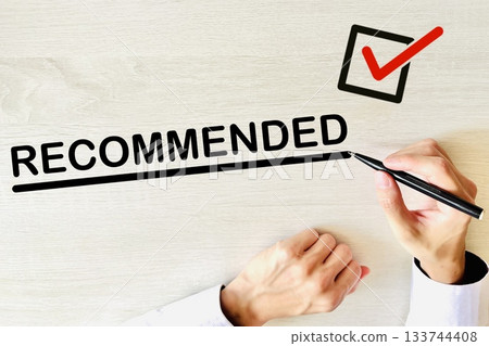 Businessman's hand introducing a recommendation 133744408