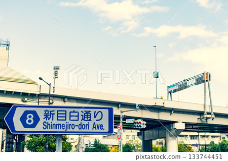 Traffic in central Tokyo Edogawabashi intersection Shin-Mejiro Street 2025.11 Warm colors 133744451