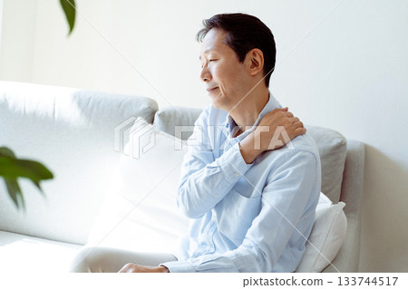 Senior man suffering from stiff neck Senior man suffering from stiff neck 133744517