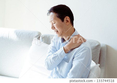 Senior man suffering from stiff neck 133744518