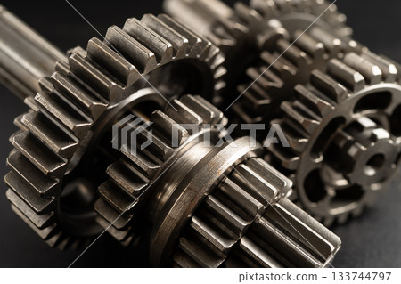 Gear and cogs wheels, clock mechanism, brass metal engine industrial. 133744797