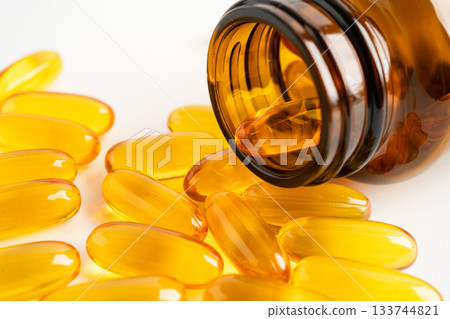 Fish oil Omega 3 capsules vitamin with EPA and DHA isolated on white background. 133744821