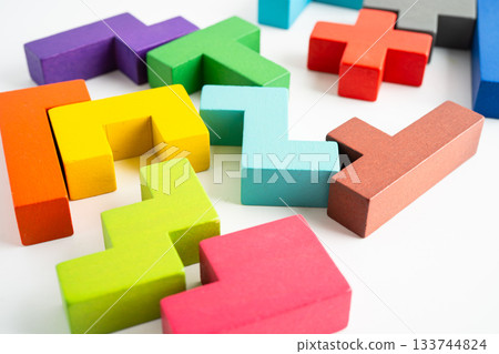 Logical thinking and problem solving creative business solution concept, wooden puzzle geometric shape block shape. 133744824