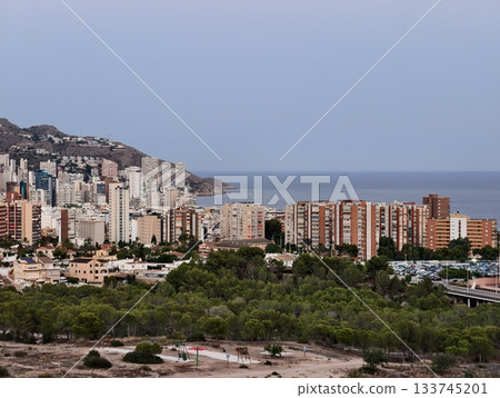 urban buildings by coast, coastal hillside buildings capturing urban and maritime views vividly 133745201