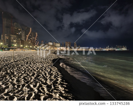 night cityscape glowing, serene waterfront reflecting vibrant city lights and industrial cranes night cityscape glowing, serene waterfront reflecting vibrant city lights and industrial cranes 133745286