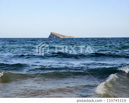 dynamic seaside scene, vibrant ocean waves crashing ashore, energized coastline with surf and foam dynamic seaside scene, vibrant ocean waves crashing ashore, energized coastline with surf and foam 133745319