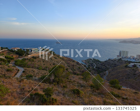 serene coastal landscape, peaceful hillside with ocean views, calm coastal terrain featuring hills serene coastal landscape, peaceful hillside with ocean views, calm coastal terrain featuring hills 133745325