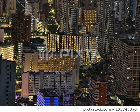 night skyline with vibrant lights, night cityscape featuring glowing towers and bustling streets night skyline with vibrant lights, night cityscape featuring glowing towers and bustling streets 133745356