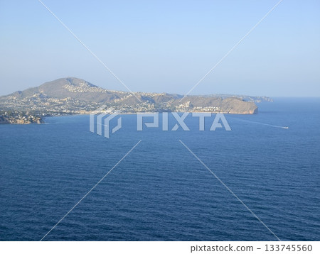beautiful seaside landscape with town, expansive coastal scene featuring deep blue waters beautiful seaside landscape with town, expansive coastal scene featuring deep blue waters 133745560