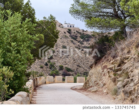 bright sky over rugged cliffs, coastal limestone bluff with vivid blue sky and rugged landscape bright sky over rugged cliffs, coastal limestone bluff with vivid blue sky and rugged landscape 133745745