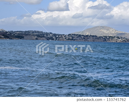 harbor and coastline landscape description, distant harbor town alongside rolling waves and clouds harbor and coastline landscape description, distant harbor town alongside rolling waves and clouds 133745762