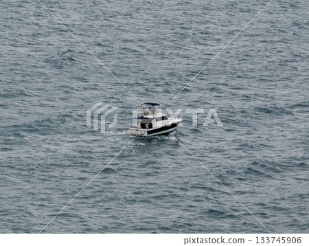 solo boat voyages, an individual vessel journeys through challenging and treacherous seas alone solo boat voyages, an individual vessel journeys through challenging and treacherous seas alone 133745906