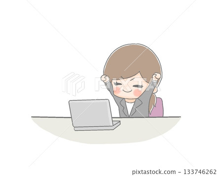 A female office worker stretching in front of a computer A female office worker stretching in front of a computer 133746262