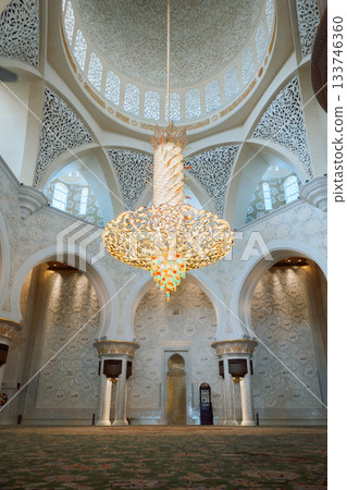 View of Sheikh Zayed Grand Mosque in Abu Dhabi. Inside mosque with famous huge seamless carpet. Vertical photo 133746360