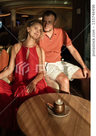 Couple in love on cruise ship. Man and woman in love enjoying their romantic vacation. Vertical photo. High quality photo Couple in love on cruise ship. Man and woman in love enjoying their romantic vacation. Vertical photo. High quality photo 133746496