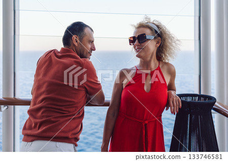 Married couple on cruise ship. Attractive couple on deck with cruise ship. High quality photo Married couple on cruise ship. Attractive couple on deck with cruise ship. High quality photo 133746581