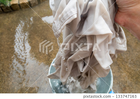 Hand wash your work clothes 133747163