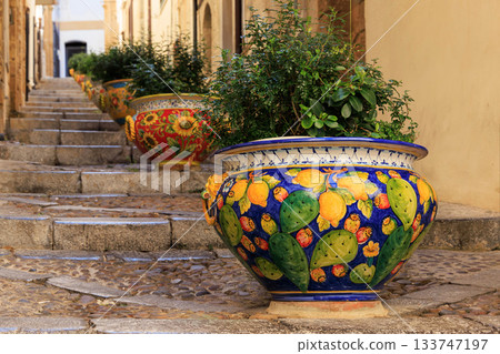 Colorful ceramic pots on a historic staircase in Cefalu, Sicily Colorful ceramic pots on a historic staircase in Cefalu, Sicily 133747197