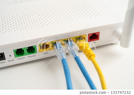 Ethernet cable with wireless router connect to internet service provider internet network. 133747232