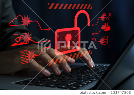 Cyber attack. Unauthorized access and intrusion into corporate network. Hacker using laptop to steal confidential data 133747808