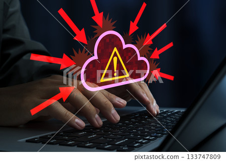 Cyber attack on cloud server. DDoS attack and cloud service outage. Hacker using laptop Cyber attack on cloud server. DDoS attack and cloud service outage. Hacker using laptop 133747809