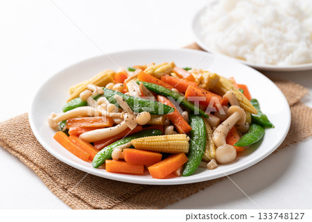 Stir fried vegetables, Green pea, Carrot, Baby corn and Shimeji mushroom with soy sauce Stir fried vegetables, Green pea, Carrot, Baby corn and Shimeji mushroom with soy sauce 133748127