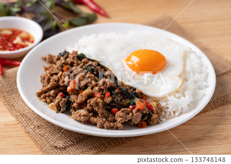 Thai food, Stir fried holy basil with minced pork with cooked rice and fried egg on top 133748148