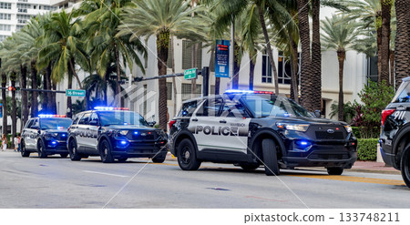 Miami, Florida, USA - November 18, 2024: Emergency 911 service. Emergency vehicle of police 911. Police car Ford Interceptor, angle view. Ford Interceptor. Police car outdoor. Police encounter 133748211
