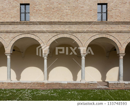 Corridor with columns and arches in an inner courtyard, Ravenna, Italy Corridor with columns and arches in an inner courtyard, Ravenna, Italy 133748593