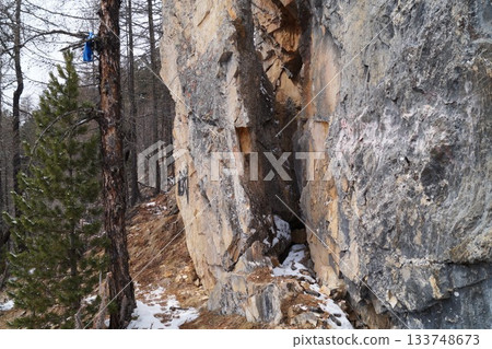 a view of a crevice in a rock high in the mountains 133748673