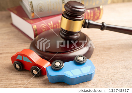Car accident lawsuit and insurance, Judge hammer with car model. Car accident lawsuit and insurance, Judge hammer with car model. 133748817