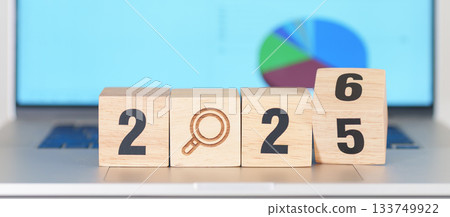 2025 end year to Happy New Year 2026 block with magnifying glass icon against laptop computer. SEO, Search Engine Optimization, hiring , Advertising, Strategy, marketing, Keyword, Content and New year 2025 end year to Happy New Year 2026 block with magnifying glass icon against laptop computer. SEO, Search Engine Optimization, hiring , Advertising, Strategy, marketing, Keyword, Content and New year 133749922