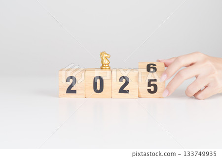 Happy New Year 2025 change to 2026 year block with horse chess. Year of the Horse, animals of the Chinese zodiac, horoscope, success and good fortune 133749935