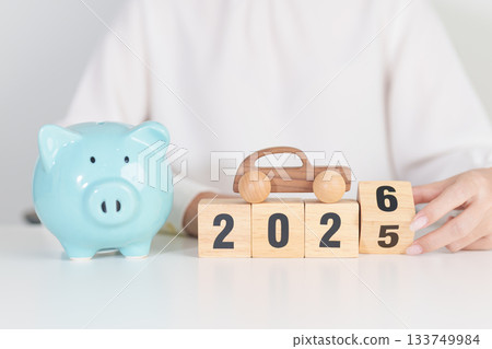 2025 end year to Happy New Year 2026 with car model and Coins Money stack for deposit and Automobile Tax. Money Saving, Car Insurance, Financial, vehicle Repair and Maintenance and New Year concept 133749984