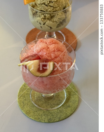 Es puter, a traditional Indonesian ice cream made from coconut milk, sugar, and various flavors, often served with toppings like fruits or nuts. Refreshing and delightful! 133750883