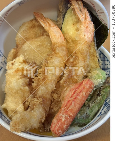 Crispy and delicious Twigim, Korean-style tempura with a variety of ingredients like vegetables and seafood, deep-fried to perfection. Enjoyed as a flavorful, crunchy street food. 133750890