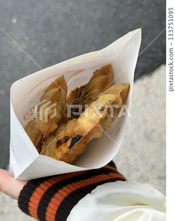 Bungeoppang, bungeo-ppang (Korean Fish Shaped Pastry), popular snack, cookies, sweet in winter streets of Korea. Bungeoppang Korean traditional national food, dish, cuisine. Japanese taiyaki 133751095