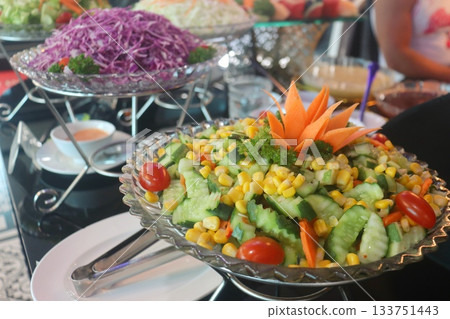 Colorful vegetable salad on the table Colorful vegetable salad on the table 133751443