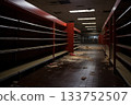 An atmospheric glimpse into a desolate store, where once-thriving aisles now stand empty and forgotten. The dim lighting casts a melancholic shadow over the vestiges of commerce. 133752507