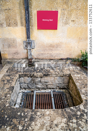 Rusted Wishes tells the story of hope preserved through time. Each coin beneath the iron grate becomes a relic of faith weathered by age. 133752611