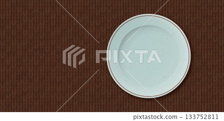 Top view of empty green mint circle dish place on brown tablecloth background Top view of empty green mint circle dish place on brown tablecloth background 133752811
