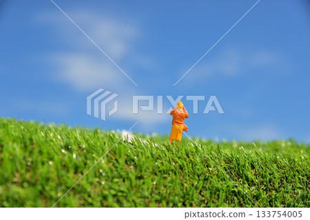 Image of a woman taking a photo with a camera 133754005