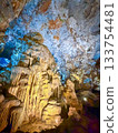 The magnificent limestone caverns of Thien Cung Cave illuminated by light (Halong Bay, Vietnam) 133754481