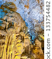 The magnificent limestone caverns of Thien Cung Cave illuminated by light (Halong Bay, Vietnam) 133754482